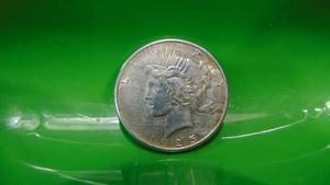 lot 13 image: 1925 Peace Silver Dollar
