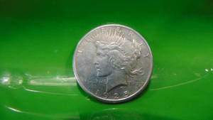 lot 16 image: 1925 Peace Silver Dollar