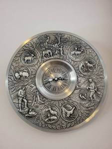 Round Silver-Tone Wall Clock with Hunting Scene Relief