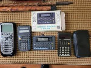 TI-89 Titanium Graphing Calculator - TI-36X Solar - HP 31E - TD Translator Data-Bank