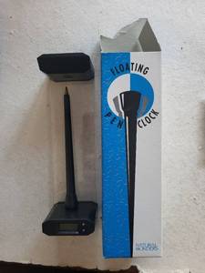 Natural Wonders Floating Pen Clock