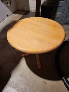 Round Wooden Table with Pedestal Base