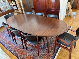 Beautiful Danish Rosewood Mid Century Modern Oval Dining Table & 8 Wood Chairs with Black Cushioned Seats and Backs
