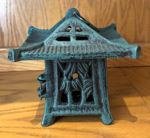 lot 55R image: LR - Cast Iron Pagoda Candle Holder