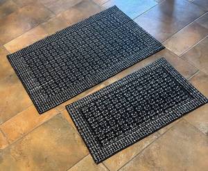 lot 104R image: LL - Two BlackWhite Floral Rugs