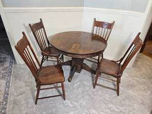 lot 68 image: Primitive Pedestal Dining Table with Pressed Back Spindle Chairs