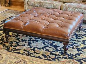 lot 27 image: Vincente Wolf Collection Tufted Leather Ottoman
