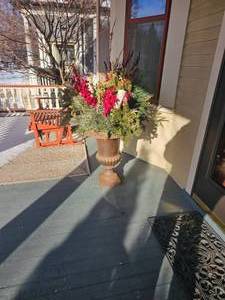 lot 106 image: Twenty Four Inch Metal Footed Urn Planter