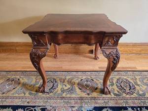 lot 23 image: Ornate Carved Wood Accent Table with Cabriole Legs and Claw Feet