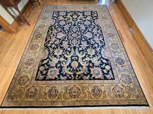 lot 1 image: Large Hand Knotted Persian Style Wool Area Rug - Black Field