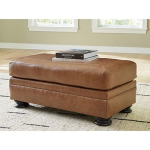 lot 2 image: Signature DESIGN BY ASHLEY Carianna Brown Leather Match Rectangle Accent Ottoman
