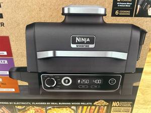 lot 31 image: Ninja Woodfire Outdoor Grill and Smoker MSRP $349.99