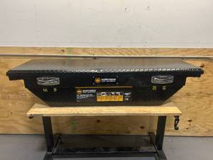 lot 40 image: Northern Tool  Equipment Short Bed Low-Profile Crossover Truck Toolbox with Removable Tray, 63in. x 20in. x 13in., Aluminum, Gloss Black, Pull Handle Latches MSRP $449.99