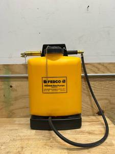 lot 91 image:  FEDCO Indian 5-Gallon Poly Tank Fire Pump