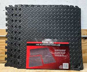 lot 254 image: Ironton Anti-Fatigue Interlocking Puzzle Floor Mats, 4-Pk. #60769 Msrp $12.99