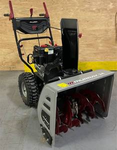 lot 298 image: Murray 24 in. 208cc Self-Propelled 2-Stage Gas Snow Blower with Electric Start Msrp $899.00