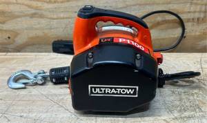 lot 307 image: Ultra-Tow Portable Electric Winch, 120V, 1100-Lb. Horizontal and Vertical Capacity, Steel Cable, Brushless Motor #5689273 Msrp $224.99