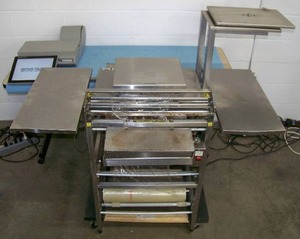 lot 4 image: Mettler Toledo 662 Step-Saver Hand Wrap Packaging Station including Mettler Toledo Digital Scale UCCWDD with Label Printer