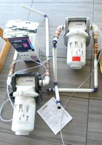 lot 27 image: Two ECOPURE systems and new filter, treats hard water