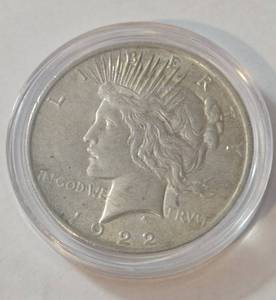 lot 55 image: 1922 Silver Peace Dollar in Airtite - High Relief - Very Collectible - AU