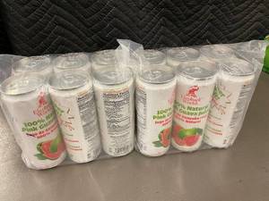 lot 58 image: Elephant World 100% Pink Guava Juice - 12-Can Pack