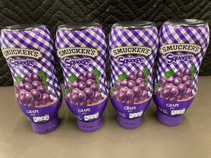 lot 203 image: Box X - Smuckers Squeeze Grape Jelly 20 oz Bottles - 4-Pack