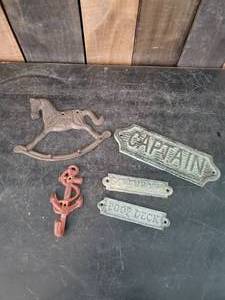 lot 59 image: Cast Metal wall hangings Captain, Poop Deck, Screw room and more