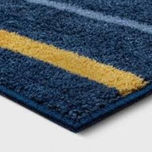 lot 24 image: 4x56 Striped Kids Rug Navy Blue - Pillowfort