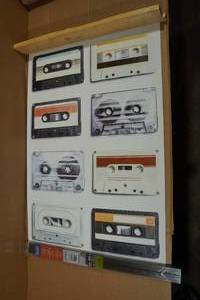 lot 77 image: Trends Wall Poster with Magnetic Frame - Cassette Tapes 22x34