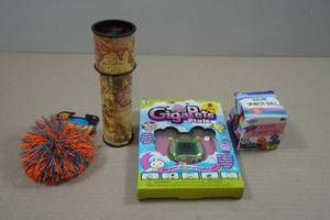 lot 100 image: GigaPets Pixie Digital Pet, Koosh and Sugar Ball and Kaleidoscope