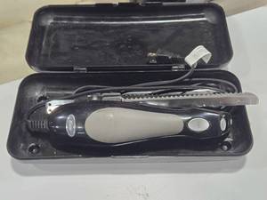 lot 557 image: Oster Household Electric Carving Knife with Case