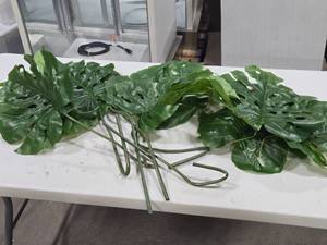 lot 589 image: Lot of (10) 40 Faux Monstera Tropical Leaf Dcor