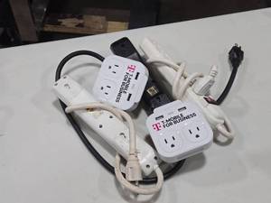 lot 642 image: (3) Power Strip Surge Protector and (2) T-Mobile Charging Stations