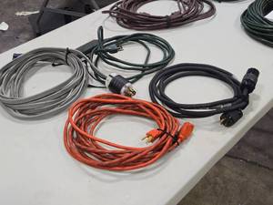 lot 611 image: Lot of (4) Extension Cords - 20 (x2) and 10 (x2) - One is 120208 Volt