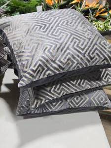 lot 649 image: Lot of (3) Delphi Velvet Throw Pillow  Greek Key Cut pattern  18 x 18 (grey)