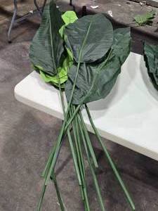 lot 564 image: Lot of (11) 53 Faux Banana Leaf Dcor