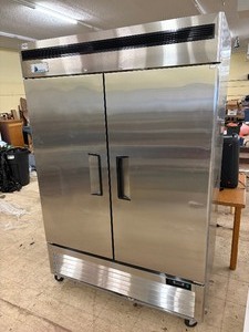 Commercial Two door Refrigerator on heavy duty castors.