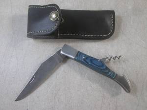 lot 231 image: (FS) 8 34 Folding Knife with Cork...