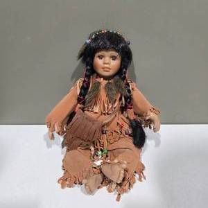 lot 12 image: Vintage Porcelain Native American Style Doll w Beaded Outfit & Braided Hair  Lot 12