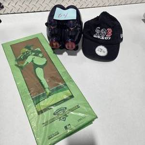 lot 64 image: Minnesota Twins Kevin Tapani 1991 Championship Season Poster  Pig Bank  Red Sox VS Japan 2007 Hat Lot