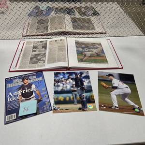 lot 66 image: Joe Mauer Signed Sports Illustrated Magazine  Twins Scrapbook Album Newspaper Clippings Photos Lot