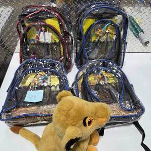 lot 73 image: (4) Disney Lion King Kids Backpacks w Plush Lion King Character Toy Simba School Travel Bags Lot