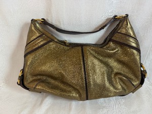 Yves Saint Laurent Gold Leather Handbag in Very Good Condition