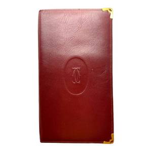 lot 65 image: Cartier Burgundy Must de Cartier Leather Long Wallet Pre-Owned Retail $695