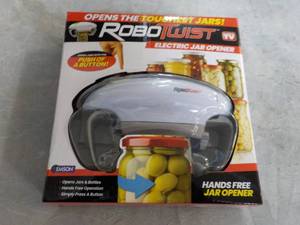 lot 189 image: Robo Twist Electric Jar Opener...
