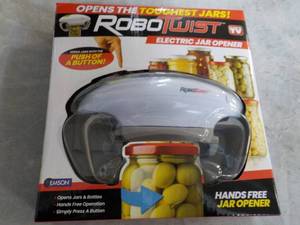 lot 190 image: Robo Twist Electric Jar Opener...