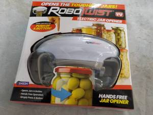 lot 192 image: Robo Twist Electric Jar Opener...