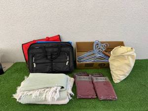 lot 37 image: New Pillowcases, Clothes Pins, Hangers & Rugs