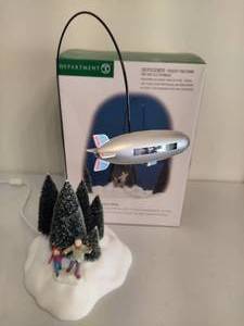 lot 7 image: Department 56 Look, Its the Goodyear Blimp Rotating Holiday Village Collectible
