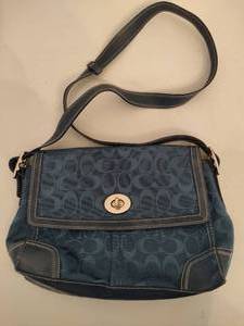 lot 107 image: Coach Medium Soho Signature C Flap Bag